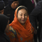
              FILE - Rosmah Mansor, wife of former Malaysian Prime Minister Najib Razak arrives at Kuala Lumpur High Court in Kuala Lumpur, Malaysia, on Oct. 4, 2018. The wife of jailed ex-Prime Minister Najib Razak arrived in court Thursday, Sept. 1, 2022, for a verdict in her corruption trial involving a 1.25 billion ringgit ($279 million) solar energy project, just days after her husband was imprisoned over the looted 1MDB state fund.(AP Photo/Yam G-Jun, File)
            