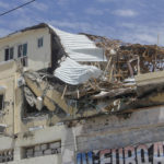 
              Damage is seen on top of the Hayat Hotel, after gunmen stormed it, in the capital Mogadishu, Somalia Sunday, Aug. 21, 2022. Somali authorities on Sunday ended a deadly attack in which at least 20 people were killed and many others wounded when gunmen from the Islamic extremist group al-Shabab, which has ties with al-Qaida, stormed the Hayat Hotel in the capital on Friday evening. (AP Photo/Farah Abdi Warsameh)
            