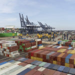 
              Shipping containers sit on the Port of Felixstowe in Suffolk, Sunday Aug. 21, 2022. Almost 2,000 workers at the U.K.'s biggest container port are launching an eight-day strike this Sunday over a pay dispute, the latest industrial action to hit the U.K. economy. (Joe Giddens/PA via AP)
            