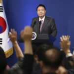 
              South Korean President Yoon Suk Yeol takes a question during a news conference to mark his first 100 days in office at the presidential office in Seoul, South Korea, Wednesday, Aug. 17, 2022. (Chung Sung-Jun/Pool Photo via AP)
            