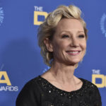 
              FILE - Anne Heche arrives at the 74th annual Directors Guild of America Awards on March 12, 2022, in Beverly Hills, Calif.  A spokesperson for  Heche says the actor is on life support after suffering a brain injury in a fiery crash a week ago and isn't expected to survive. The statement released on behalf of her family said she is being kept on life support to determine if she is a viable organ donor.  (Photo by Jordan Strauss/Invision/AP, File)
            