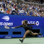 
              Serena Williams, of the United States, returns a shot to Anett Kontaveit, of Estonia, during the second round of the U.S. Open tennis championships, Wednesday, Aug. 31, 2022, in New York. (AP Photo/Seth Wenig)
            