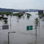 
              A part of a park along the Han River are flooded due to heavy rain in Seoul, South Korea, Wednesday, Aug. 10, 2022. Cleanup and recovery efforts gained pace in South Korea's greater capital region Wednesday as skies cleared after two days of record-breaking rainfall that unleashed flash floods, damaged thousands of buildings and roads and killed multiple people. (AP Photo/Ahn Young-joon)
            