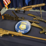 
              Firearms are displayed during a news conference at the Homeland Security Investigations Miami Field Office (HSI), Wednesday, Aug. 17, 2022, in Miami. HSI is working with other agencies to highlight efforts to crack down on a recent increase of firearms and ammunition smuggling to Haiti and other Caribbean nations. (AP Photo/Lynne Sladky)
            