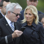 
              First lady Jill Biden consoles Jeff Heisey, United Airlines Master Executive Council Secretary Treasurer as he struggles to read the names of coworkers killed on Flight 93 during a remembrance ceremony at the Flight 93 National Memorial Wall of Names for the 21st anniversary of the Sept. 11, 2001 terrorist attacks in Shanksville, Pa., Sunday, Sept. 11, 2022. (John Rucosky/Tribune-Democrat via AP)
            