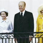 
              FILE - Queen Elizabeth II, left, waves from the balcony of the White House, in Washington as she stands with U.S. President Gerald Ford and first lady Betty Ford on July 7, 1976. Queen Elizabeth II, Britain's longest-reigning monarch and a rock of stability across much of a turbulent century, died Thursday, Sept. 8, 2022, after 70 years on the throne. She was 96. (AP Photo/Staff/Green, File)
            
