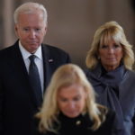 
              US President Joe Biden and First Lady Jill Biden view the coffin of Queen Elizabeth II, lying in state on the catafalque in Westminster Hall, at the Palace of Westminster, London, Sunday, Sept. 18, 2022.  (Jacob King/Pool Photo via AP)
            