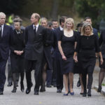 
              Foreground from left, Britain's Prince Andrew, Prince Edward, Lady Louise Windsor, Sophie, Countess of Wessex, Second row,  Princess Anne, the Princess Royal, Vice Admiral Timothy Laurence, Zara Tindall, Peter Phillips and Princess Eugenie walk, to thank members of the public  following the death of Queen Elizabeth II on Thursday, at Balmoral, Scotland, Saturday, Sept. 10, 2022. (Owen Humphreys/Pool Photo via AP)
            