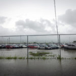 
              A parking lot is flooded due to Hurricane Fiona in Salinas, Puerto Rico, Monday, Sept. 19, 2022. (AP Photo/Alejandro Granadillo)
            