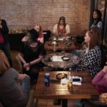 
              Kelly Dillaha, left, talks women during a Red Wine and Blue event in Utica, Mich., Tuesday, Sept. 20, 2022. (AP Photo/Paul Sancya)
            