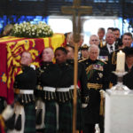 
              Center from front, Britain's King Charles III and Camilla, the Queen Consort, Princess Anne and Tim Laurence, and Prince Andrew follow the coffin as they enter the cathedral for a Service of Prayer and Reflection for the Life of Queen Elizabeth II at St Giles' Cathedral, Edinburgh Monday, Sept. 12, 2022. (Jane Barlow/PA via AP)
            