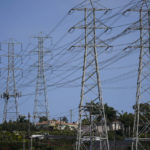 
              Power transmission towers stand near homes in Redondo Beach, Calif., Wednesday, Sept. 7, 2022. With record demand on power supplies across the West, California snapped its record energy use around 5 p.m. with 52,061 megawatts, far above the previous high of 50,270 megawatts set July 24, 2006. (AP Photo/Jae C. Hong)
            