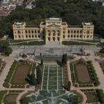
              The Paulista Museum, known by Brazilians as the Ipiranga Museum is seen from above Independence park in Sao Paulo, Brazil, Thursday, Sept. 1, 2022. After nearly a decade of renovations, the museum founded in 1895 by a creek where emperor Pedro I declared the nation's independence from Portugal is reopening as part of the country's bicentennial celebrations. (AP Photo/Andre Penner)
            