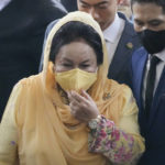 
              Rosmah Mansor, wife of former Malaysian Prime Minister Najib Razak, arrives at Kuala Lumpur High Court in Kuala Lumpur, Thursday, Sept. 1, 2022. The wife of jailed ex-Prime Minister Najib Razak arrived in court Thursday, for a verdict in her corruption trial involving a 1.25 billion ringgit ($279 million) solar energy project, just days after her husband was imprisoned over the looted 1MDB state fund.  (AP Photo/Vincent Thian)
            