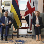 
              British Prime Minister Liz Truss meets Prime Minister of Mauritius Pravind Jugnauth for a bilateral meeting during the 77th UN General Assembly in New York, Wednesday, Sept. 21, 2022. (Toby Melville/Pool via AP)
            