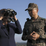 
              U.S. Vice President Kamala Harris, left, uses binoculars at the military observation post as she visits the demilitarized zone (DMZ) separating the two Koreas, in Panmunjom, South Korea Thursday, Sept. 29, 2022. (Leah Millis/Pool Photo via AP)
            