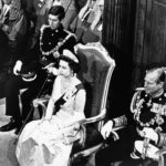 
              FILE - In this March 13, 1970 file photo, Britain's Queen Elizabeth II, centre, sits in the Chamber in Wellington, where she formally opened the Parliament with Prince Charles at left and Prince Philip on the right, in London. Prince Charles has been preparing for the crown his entire life. Now, that moment has finally arrived. Charles, the oldest person to ever assume the British throne, became king on Thursday Sept. 8, 2022, following the death of his mother, Queen Elizabeth II. (AP Photo, File)
            
