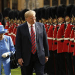 
              FILE - President Donald Trump and Queen Elizabeth II inspect a Guard of Honour, formed of the Coldstream Guards at Windsor Castle in Windsor, England, July 13, 2018. Queen Elizabeth II, Britain's longest-reigning monarch and a rock of stability across much of a turbulent century, died Thursday, Sept. 8, 2022, after 70 years on the throne. She was 96. (AP Photo/Matt Dunham, Pool, File)
            