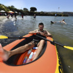 
              Luis Vazquez, of Fairfield, sits in his inflatable boat looking for the perfect song to play before heading out onto the water on Labor Day in Benicia, Calif., on Monday, Sept. 5, 2022. The Bay Area is experiencing an excessive heat warning as temperatures soar above 104 degrees in the East Bay. (Jose Carlos Fajardo/Bay Area News Group via AP)
            
