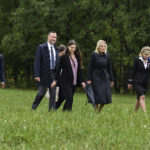 
              First lady Jill Biden returns after visiting a boulder marking the impact site of Flight 93 with family members of those who died aboard the flight following a ceremony commemorating the 21st anniversary of the Sept. 11, 2001 terrorist attacks in Shanksville, Pa., Sunday, Sept. 11, 2022. (AP Photo/Barry Reeger)
            