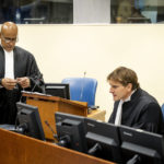 
              Prosecutors Rashid Salim Rashid, left, and Rupert Elderkin in court at the UN International Residual Mechanism for Criminal Tribunals (IRMCT) in The Hague, Thursday, Sept. 29 2022. Felicien Kabuga, who is accused of encouraging and bankrolling the country's 1994 genocide, goes on trial at a United Nations tribunal Thursday, nearly three decades after the 100-day massacre left 800,000 dead. (Koen van Weel/Pool Photo via AP)
            