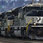 
              FILE - A Norfolk Southern freight train makes its way through Homestead, Pa., on April 27, 2022. Business and top officials are bracing for the possibility of a nationwide rail strike Friday, Sept. 16, 2022, while talks continue between the nation's largest freight railroads and their unions. (AP Photo/Gene J. Puskar, File)
            