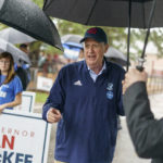 
              Rhode Island Gov. Dan McKee speaks to supporters after casting his vote in the state's primary election at the Community School, Tuesday, Sept. 13, 2022, in Cumberland, R.I. (AP Photo/David Goldman)
            
