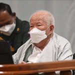 
              In this photo released by the Extraordinary Chambers in the Courts of Cambodia, Khieu Samphan, the former head of state for the Khmer Rouge, sits in a courtroom during a hearing at the U.N.-backed war crimes tribunal in Phnom Penh, Cambodia, Thursday, Sept. 22, 2022. The international court convened in Cambodia to judge the Khmer Rouge for its brutal 1970s rule ended its work Thursday after spending $337 million and 16 years to convict just three men of crimes after the regime caused the deaths of an estimated 1.7 million people. (Nhet Sok Heng/Extraordinary Chambers in the Courts of Cambodia via AP)
            