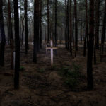 
              A view of unidentified graves of civilians and Ukrainian soldiers in a cemetery in the recently retaken area of Izium, Ukraine, Thursday, Sept. 15, 2022 who had been killed by Russian forces near the beginning of the war. A mass grave of Ukrainian soldiers and unknown buried civilians was found in the forest of recently recaptured city of Izium. (AP Photo/Evgeniy Maloletka)
            