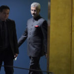 
              Foreign Minister of India Subrahmanyam Jaishankar, center, is escorted as he arrives to address the 77th session of the United Nations General Assembly, Saturday, Sept. 24, 2022 at U.N. headquarters. (AP Photo/Mary Altaffer)
            