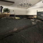 
              Extensive damage from a slow-moving black river of sludge is seen inside the Oak Glen Steakhouse and Saloon on Wednesday, Sept. 14, 2022, in Oak Glen, Calif. (AP Photo/Amy Taxin)
            