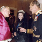 
              FILE - In this Oct. 17, 1980 file photo, Britain's Queen Elizabeth II, smiles at her husband Prince Philip, during an audience with Pope John Paul II in his private study at the Vatican, Italy. Buckingham Palace officials say Prince Philip, the husband of Queen Elizabeth II, has died, it was announced on Friday, April 9, 2021.  Queen Elizabeth II, Britain’s longest-reigning monarch and a rock of stability across much of a turbulent century, has died. She was 96. Buckingham Palace made the announcement in a statement on Thursday Sept. 8, 2022.(AP Photo/Arturo Mari, File)
            