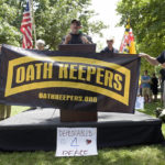 
              FILE - Stewart Rhodes, founder of the citizen militia group known as the Oath Keepers, center, speaks during a rally outside the White House in Washington, on June 25, 2017. The trial of Rhodes and four associates charged with seditious conspiracy in the attack on the U.S. Capitol is set to begin next week. (AP Photo/Susan Walsh, File)
            