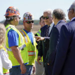 
              President Joe Biden speaks with workers at the groundbreaking of the new Intel semiconductor manufacturing facility in New Albany, Ohio, Friday, Sep. 9, 2022. (AP Photo/Manuel Balce Ceneta)
            