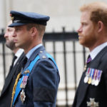 
              Prince William, center, and Prince Harry, right, arrive at Westminster Abbey on the day of Queen Elizabeth II funeral in central London, Monday, Sept. 19, 2022. The Queen, who died aged 96 on Sept. 8, will be buried at Windsor alongside her late husband, Prince Philip, who died last year. ( James Manning/Pool Photo via AP)
            