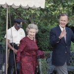 
              FILE - U.S. President George H.W. Bush escorts Queen Elizabeth II from the White House to a helicopter en route to Baltimore to watch her first major league baseball game, in Washington, May 15, 1991. Queen Elizabeth II, Britain's longest-reigning monarch and a rock of stability across much of a turbulent century, died Thursday, Sept. 8, 2022, after 70 years on the throne. She was 96. (AP Photo/Doug Mills, File)
            
