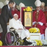 
              Pope Francis leaves on a wheelchair after a Mass at the Expo Grounds in Nur-Sultan, Kazakhstan, Wednesday, Sep. 14, 2022. Pope Francis is on the second day of his three-day trip to Kazakhstan. (AP Photo/Alexander Zemlianichenko)
            