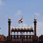 
              The Indian flag flies at half-mast at the historic Red Fort following Thursday’s death of Britain's Queen Elizabeth II in New Delhi, India, Sunday, Sept.11, 2022. (AP Photo/Manish Swarup)
            