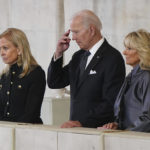 
              US President Joe Biden and First Lady Jill Biden view the coffin of Queen Elizabeth II lying in state on the catafalque in Westminster Hall, at the Palace of Westminster, London, Sunday Sept. 18, 2022. (Joe Giddens/Pool Photo via AP)
            