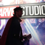 
              A cosplayer dressed as Doctor Strange passes by a Marvel Studios exhibit at the D23 Expo Saturday, Sept. 10, 2022, in Anaheim, Calif. (AP Photo/Mark J. Terrill)
            