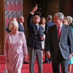 
              FILE - In this June 15, 2008 file photo, Queen Elizabeth II and Prince Philip, the Duke of Edinburgh, pointing, walk with U.S. President George Bush and his wife Laura, in St George's Hall, Windsor Castle, in Windsor, England. (Nick Ray, Pool Photo via AP, File)
            