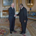 
              King Charles III receives Prime Minister of Papua New Guinea James Marape in the 1844 Room at Buckingham Palace in London, Sunday, Sept. 18, 2022. ( Kirsty O'Connor/Pool Photo via AP)
            