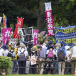 
              Protestors rally against the controversial state-sponsored funeral of former Prime Minister Shinzo Abe, Tuesday, Sept. 27, 2022, in Tokyo. Abe was assassinated in July. (AP Photo/Christopher Jue)
            