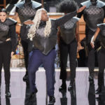 
              Host Kenan Thompson and dancers perform a tribute to 'House of the Dragon' at the 74th Primetime Emmy Awards on Monday, Sept. 12, 2022, at the Microsoft Theater in Los Angeles. (AP Photo/Mark Terrill)
            