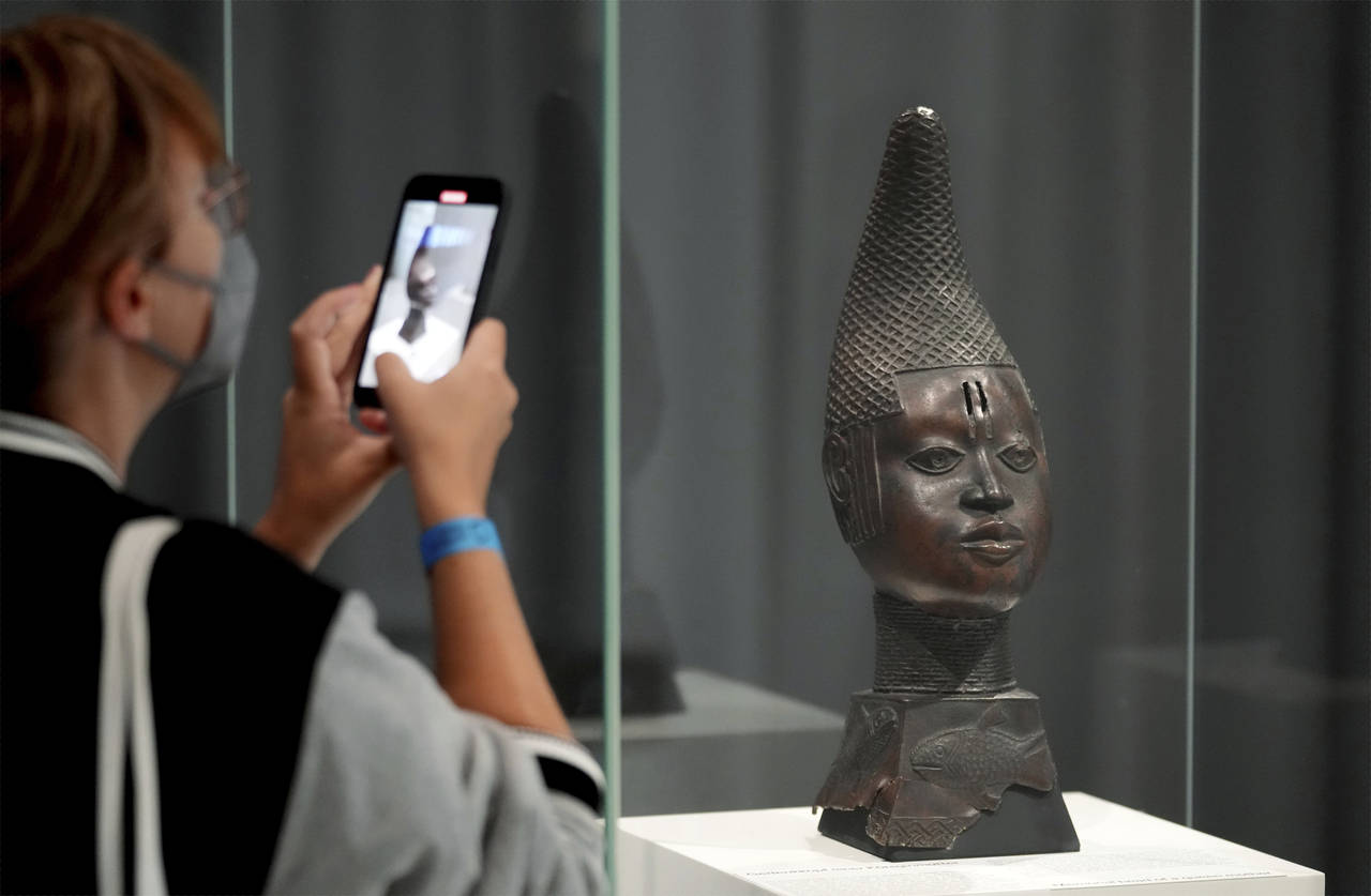 Benin Bronzes, that were stolen in Africa during colonial times, are displayed in Berlin, Germany, ...