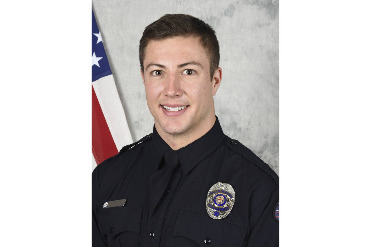 This undated photo released by the Arvada Police Department shows officer Dillon Vakoff, who died a...