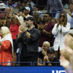 
              Fans including Alexis Ohanian cheer for Serena Williams, of the United States, during a match against Ajla Tomljanovic, of Australia, during the third round of the U.S. Open tennis championships, Friday, Sept. 2, 2022, in New York. (AP Photo/John Minchillo)
            