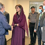 
              In this handout photo released by Pakistan Foreign Ministry Press Service, U.N. Secretary-General Antonio Guterres, left, was received on his arrival by Deputy Foreign Minister Hina Rabbani Khar in the airport in Islamabad, Pakistan, Friday, Sept. 9, 2022. U.N. Guterres appealed to the world to help Pakistan after arriving in the country Friday to see damage from the record floods that have killed hundreds and left more than half a million people homeless and living in tents under the open sky. (Pakistan Foreign Ministry Press Service via AP)
            