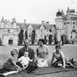
              FILE - In this Sept. 1960, photo, Britain's Queen Elizabeth II, Prince Philip and their children, Prince Charles, right, Princess Anne and Prince Andrew, pose for a photo on the lawn of Balmoral Castle, in Scotland. When the hearse carrying Queen Elizabeth II's body pulled out of the gates of Balmoral Castle on Sunday, Sept. 11, 2022, it marked the monarch's final departure from a personal sanctuary where she could shed the straitjacket of protocol and ceremony for a few weeks every year. The sprawling estate in the Scottish Highlands west of Aberdeen was a place where Elizabeth rode her beloved horses, picnicked, and pushed her children around the grounds on tricycles and wagons, setting aside the formality of Buckingham Palace. (AP Photo/File)
            