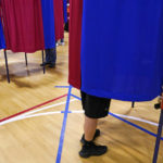
              Voters cast their ballots, Tuesday, Sept. 13, 2022, at a polling station in Derry, N.H. (AP Photo/Charles Krupa)
            